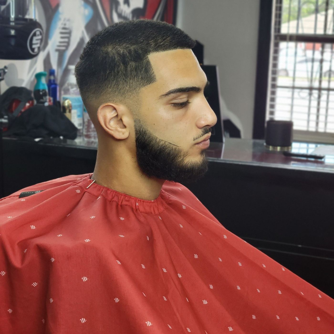 Skin fade with sculpted beard at Plan A Barbers